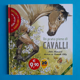 Un prato pieno di cavalli