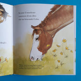 Un prato pieno di cavalli