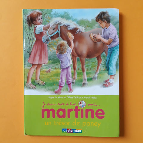 Je commence à lire avec Martine. Un trésor de poney